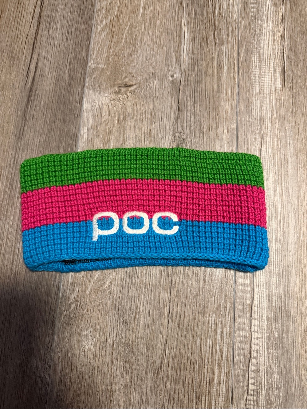 POC Crochet Headband featuring the distinctive white POC logo